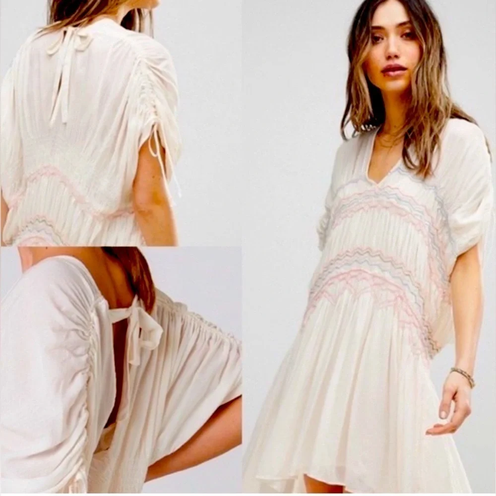 Free People Embroidered dress has peasant-style romantic, vintage-inspired Sz S
